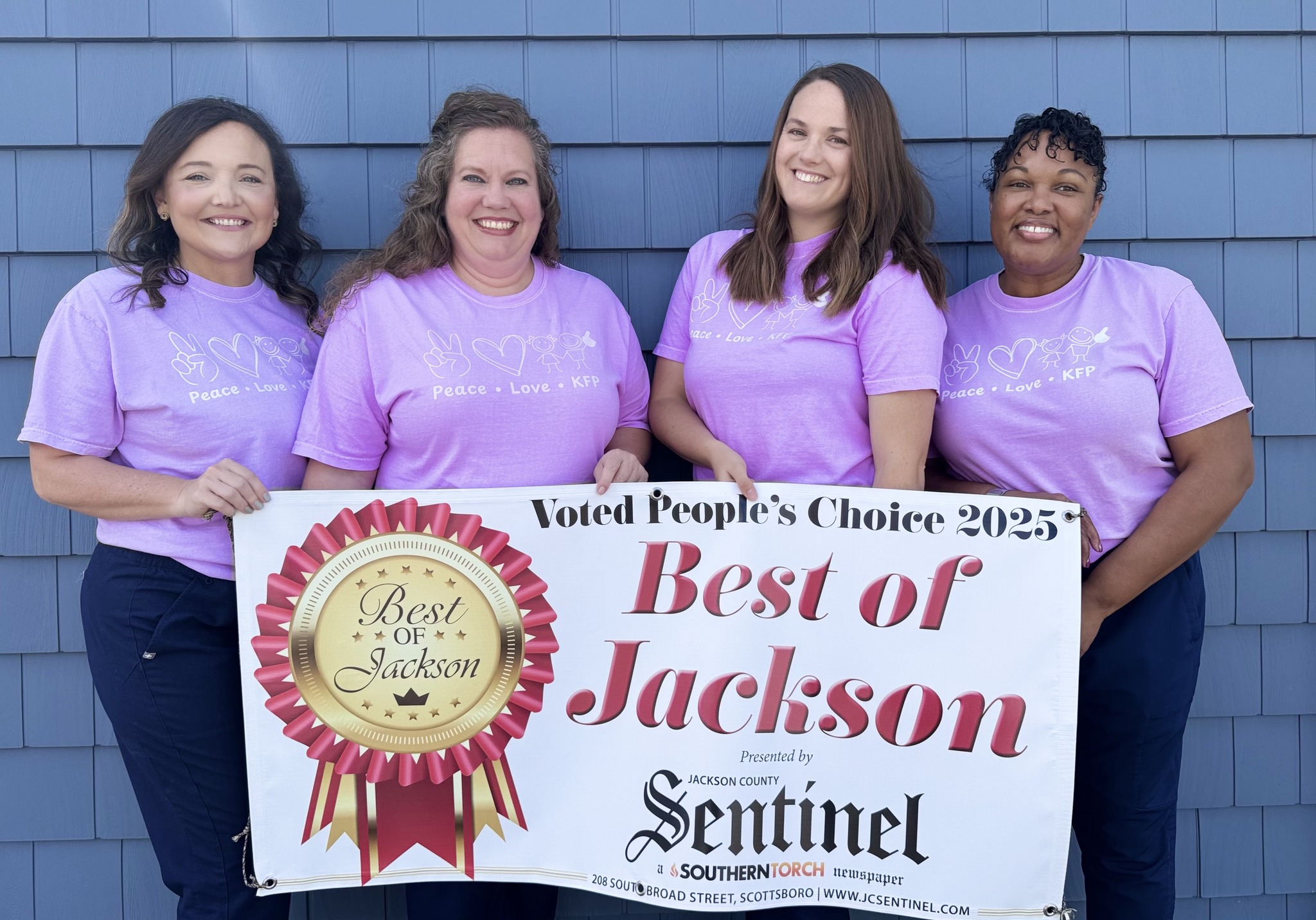 Four Kids First Pediatrics providers holding the 2025 Best of Jackson award